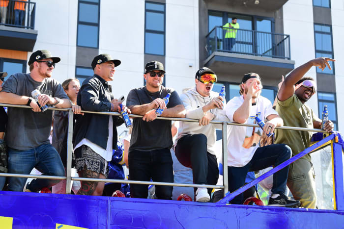 Feb 16, 2022; Los Angeles, CA, USA; Los Angeles Rams players celebrateduring the championship victory parade. Mandatory Credit: Gary A. Vasquez-USA TODAY Sports